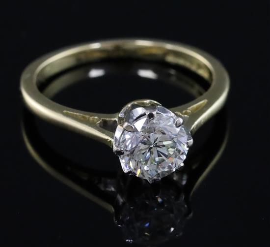 A modern 18ct gold and solitaire diamond ring, size K.